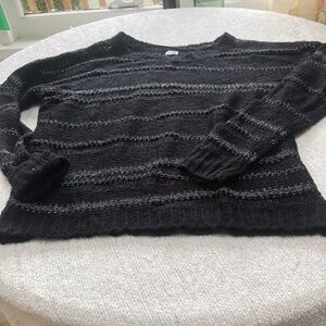 Kismet black and sparkly silver sweater for those cool spring mornings,. Large